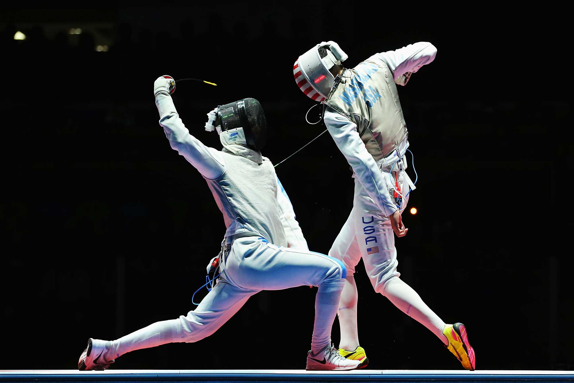 Olympic fencing training at Salle Bosco Fencing Center — foil, epee and saber lessons in North Alabama